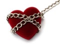 Red heart locked with chain