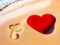 A red heart made out of sand on beach, of sand background. With space for text. Generative AI Royalty Free Stock Photo