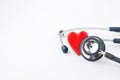Red heart made of plastic with medical stethoscope isolated from white background. Royalty Free Stock Photo