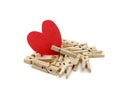 Red heart on many wooden pins Royalty Free Stock Photo