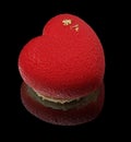 Red heart mousse cake with golden sides