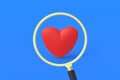 Red heart near magnifier on blue background