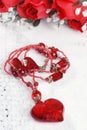 Red heart necklace on lace Royalty Free Stock Photo