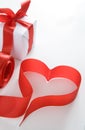 Red heart next to the gift Royalty Free Stock Photo