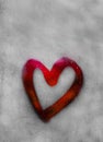 Red heart outline painted on sweaty glass, there are many drops on it, inscription heart and love using handmade on wet autumn