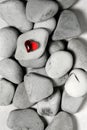 Red heart on pebble stones, still life. Valentines day and lovers background Royalty Free Stock Photo