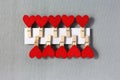 Many red hearts with clothespin Royalty Free Stock Photo