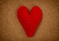 Red heart on pressured cork background