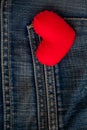 Red Heart put on an old blue jeans. Means love for denim. Royalty Free Stock Photo