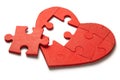 Red heart puzzle on white background. Concept second half of the heart in love for Valentine`s Day or illness Royalty Free Stock Photo