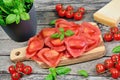 Red heart ravioli with tomato, mozzarella and basil Royalty Free Stock Photo