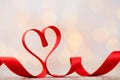Red heart of ribbon. Valentines day background.