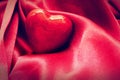 Red heart in satin cloth. Love background Royalty Free Stock Photo