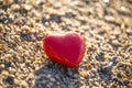 Red heart by the sea, romantic, in love, lost, holiday