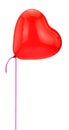 Red heart shape balloon and ribbon flying isolated on white background Royalty Free Stock Photo
