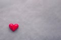 Red heart shape with bow on black gray background. Valentine`s Royalty Free Stock Photo