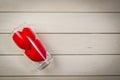 Red heart shape in glass on wooden table, valentine concept Royalty Free Stock Photo