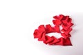 Red heart shape of rose petal flower on white background, image romantic love symbol Royalty Free Stock Photo