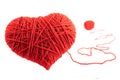 Red heart shape symbol made from wool