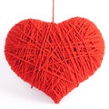 Red heart shape symbol made from wool