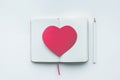 Red Heart Shape On White Notepad Background.love,valentine
