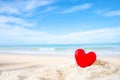 Red Heart shape on white sand beach ,Image for love valentine day or summer vacation concept Royalty Free Stock Photo