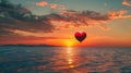 Red Heart Shaped Balloon Flying Over Ocean at Sunset Royalty Free Stock Photo