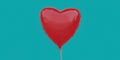 Red heart shaped balloon isolated on a blue background Royalty Free Stock Photo