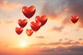 Red heart-shaped balloons in the sky at sunset.Valentine\'s Day banner with space for your own content. Whiteground color. Royalty Free Stock Photo