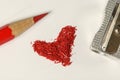 Red heart shaped debris from pencil Valentins day concept