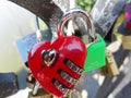 Red heart shaped padlock on a bridge. Conceptual love or background Royalty Free Stock Photo