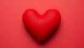 Red Heart-Shaped Pillow on Red Background Royalty Free Stock Photo