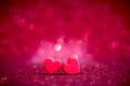 Red Heart shapes on abstract light glitter background in love co Royalty Free Stock Photo