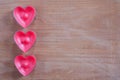 Red Heart Shapes On Wooden Board. Royalty Free Stock Photo