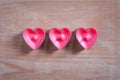 Red Heart Shapes On Wooden Board. Royalty Free Stock Photo