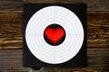 Red heart on shooting target