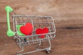 Red heart sign in shopping cart Royalty Free Stock Photo