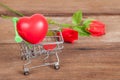 Red heart sign in shopping cart Royalty Free Stock Photo