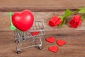 Red heart sign in shopping cart Royalty Free Stock Photo