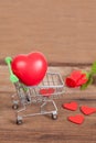 Red heart sign in shopping cart Royalty Free Stock Photo