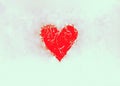 Red heart with snow and ice. Royalty Free Stock Photo