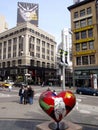 Red Heart Statue and Livestrong Ad in Union Square Royalty Free Stock Photo