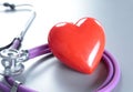 Red heart and a stethoscope on cardiagram Royalty Free Stock Photo