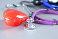 Red heart and a stethoscope on cardiagram Royalty Free Stock Photo