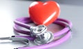 Red heart and a stethoscope on cardiagram Royalty Free Stock Photo