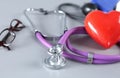 Red heart and a stethoscope on cardiagram Royalty Free Stock Photo