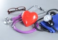 Red heart and a stethoscope on cardiagram Royalty Free Stock Photo