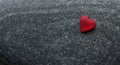Red heart on stones. Valentines Day background Royalty Free Stock Photo