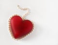 Red Heart Surrounded with Pearls Royalty Free Stock Photo