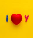 i love you symbol on yellow background